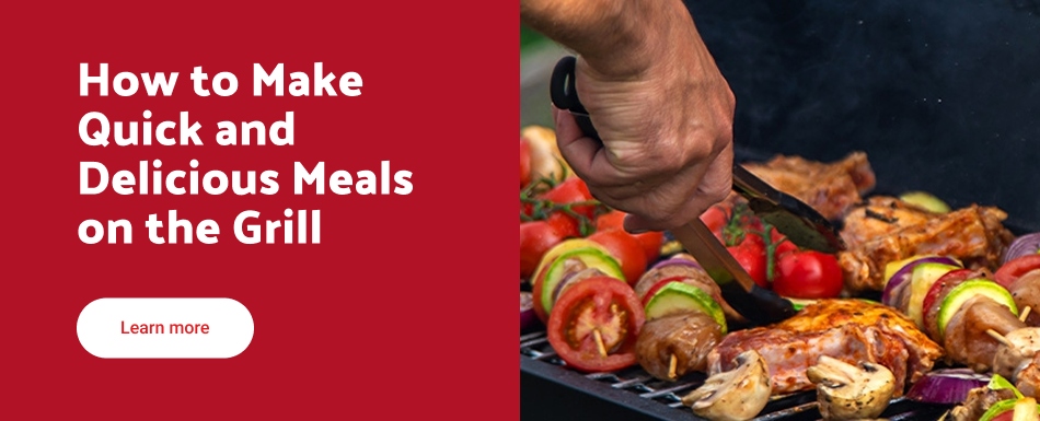 Text reading: "Grilled pork chops with corn salad. Discover recipe.' Image shows four grilled pork chops on a wooden board beside a bowl of corn and tomato salad."